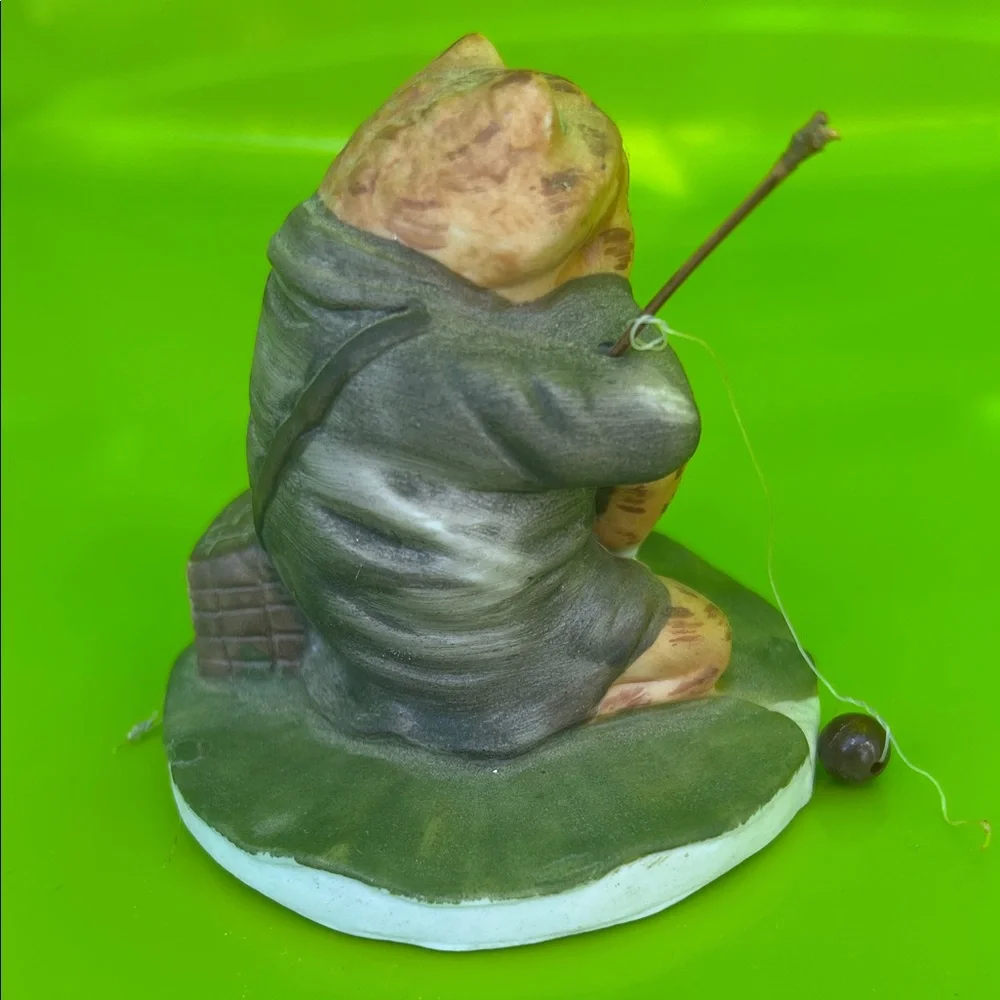 Vintage Reptile Figurine with Fishing Rod
